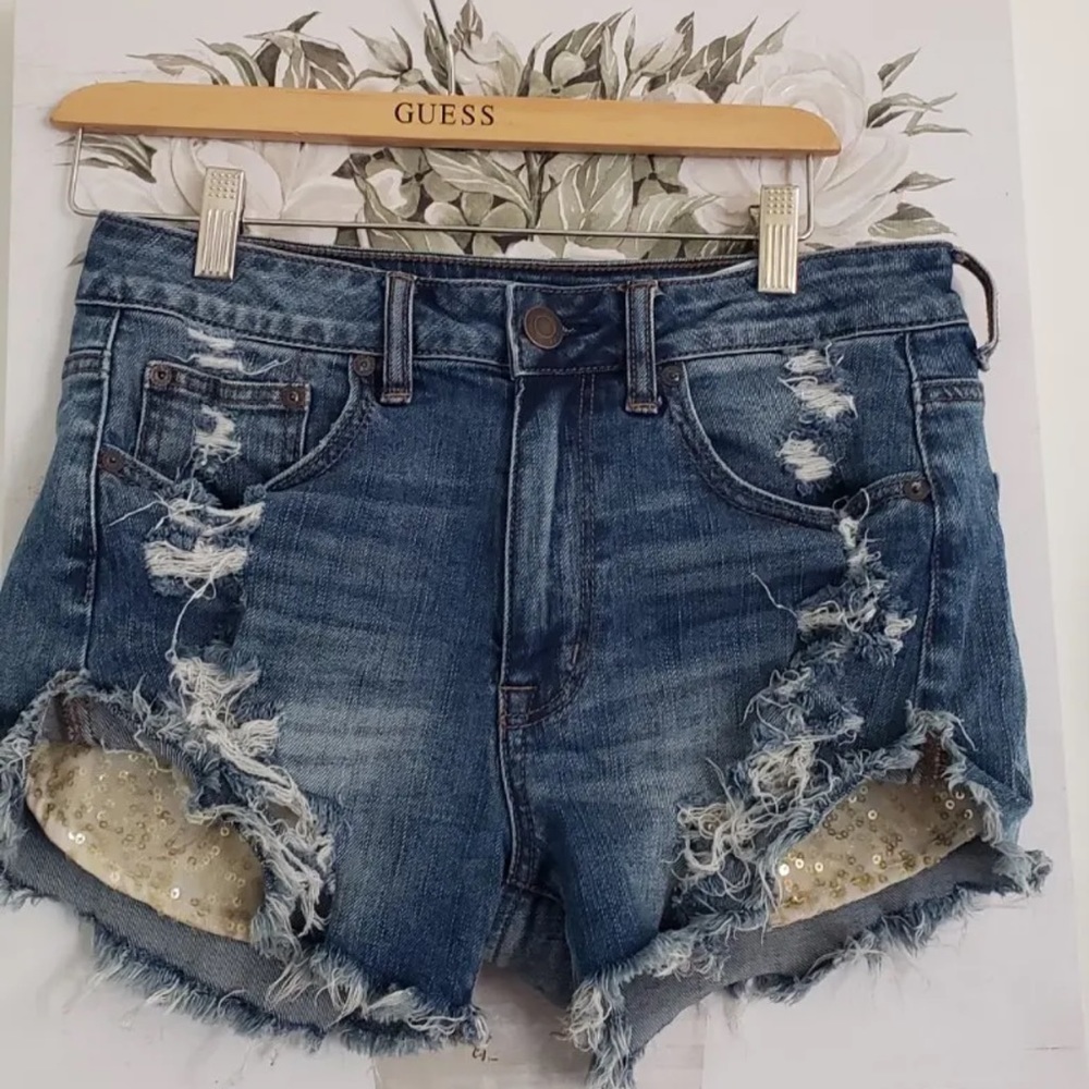Gorgeous sequin pockets American Eagle 6 Distressed Stretch Shorts.